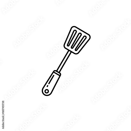 Stainless steel spatula for flipping and stirring food during cooking and grilling.