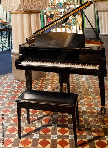 Photography A Piano inside of the Queen Victoria Building, The QVB, a historical building that is home to a variety of boutique stores and cafes, built in 1898 in Romanesque style