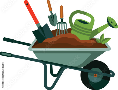 Gardening tools and wheelbarrow filled with soil