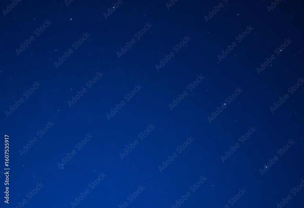 Obraz premium Deep blue gradient sky speckled with vibrant blue stars, dark blue background, sky