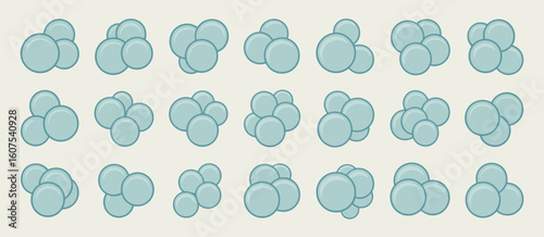 Collection of stylized blue oval shapes in clusters representing cells or molecules
