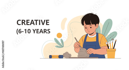 Boy Concentrating On Shaping Clay During Art Class Learning New Skills