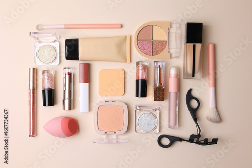 cosmetic makeup products ideal for beauty lovers. Top view on bright background