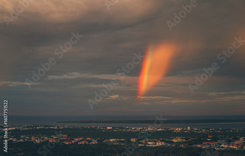 Sunrise and rainbow over the mountains in the Caribbean, Bonaire