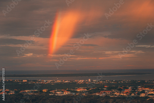 Sunrise and rainbow over the mountains in the Caribbean, Bonaire