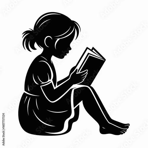 Silhouette of a Girl Reading a Book