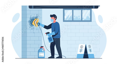 Man Cleaning Wall In Protective Gear With Sponge And Spray Solution