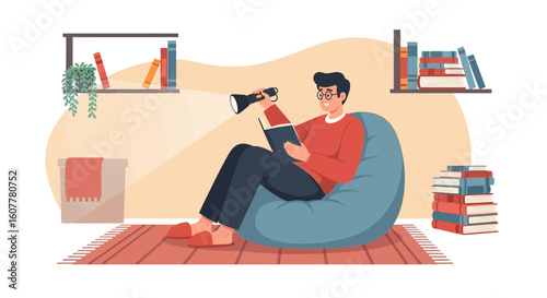 Man Reading A Book In Beanbag Using Flashlight At Home Interior Design