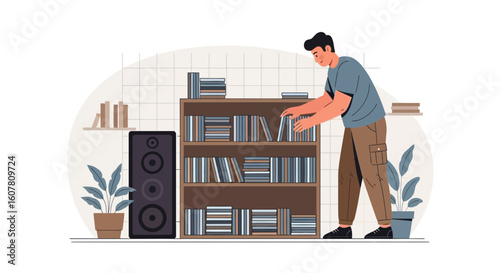 Organizing Media: Man Arranging Books and Discs on Bookshelf At Home
