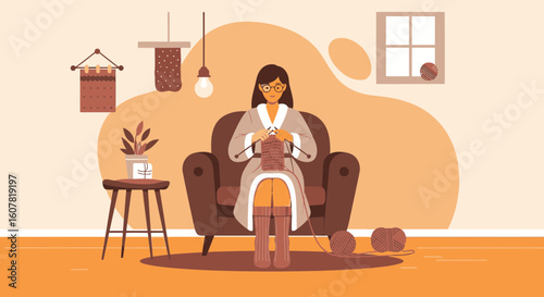Woman Relaxing At Home Knitting In Her Cozy Armchair On Quarantine Day