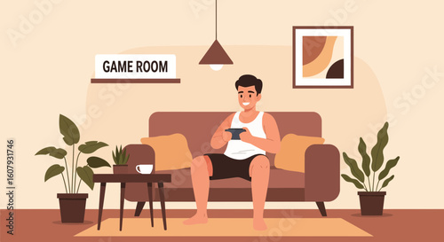 Young Man Relaxing At Home Playing Mobile Game On Sofa In The Game Room
