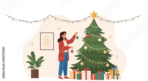 Young Woman Decorating A Christmas Tree At Home For Holiday Celebration