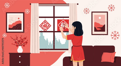 Young Woman Decorating Home Window For The Chinese New Year Festive Season