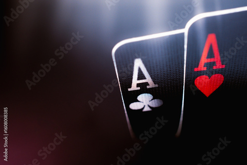 Tableau sur toile A pair of aces on a black background, close up.