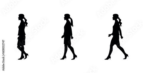 walking woman silhouettes on black colour