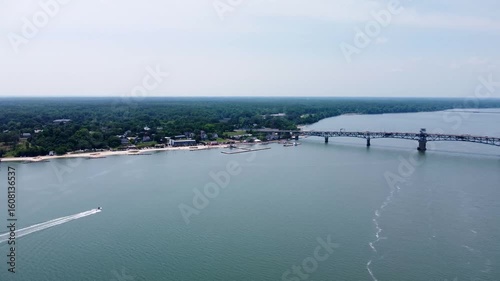 Wallpaper Mural Aerial cinematic video of downtown Yorktown Virginia and the Coleman Bridge spanning the York River. Torontodigital.ca