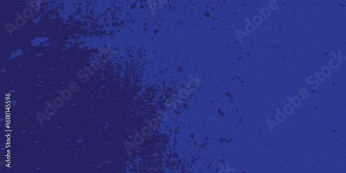 Abstract grunge background with a distressed paint splatter effect in dark blue and violet tones. 