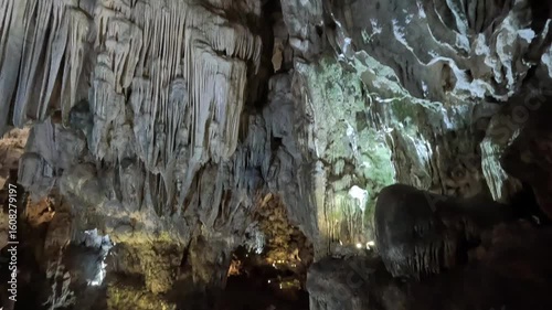 Intricate limestone formations and dramatic textures create a breathtaking underground landscape inside Thien Cung Cave, Ha Long Bay, Vietnam.