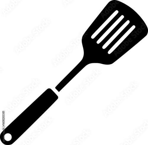 A sleek black spatula with ventilation slots and a hanging hole on a white backdrop
