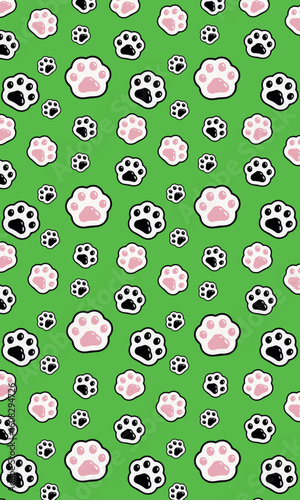 Seamless pattern of cute pink and black cartoon paw prints on a bright green background