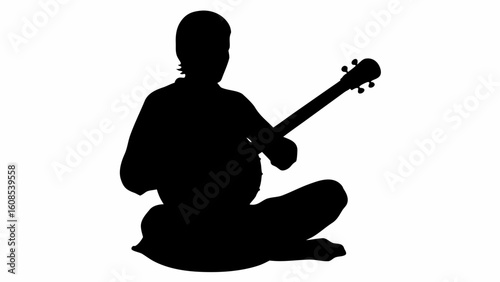 Silhouette of a person sitting cross legged playing a stringed instrument against a white background view | editable eps vectors