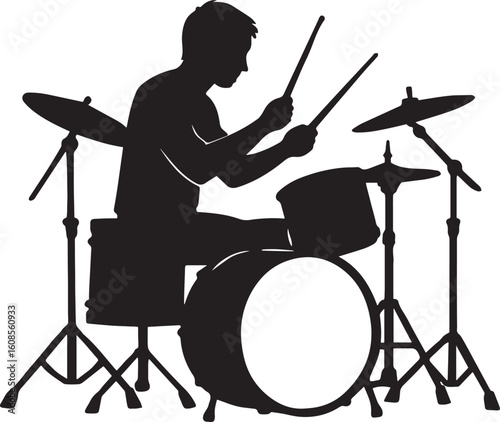 Silhouette of a musician playing a drum set with drumsticks in action pose