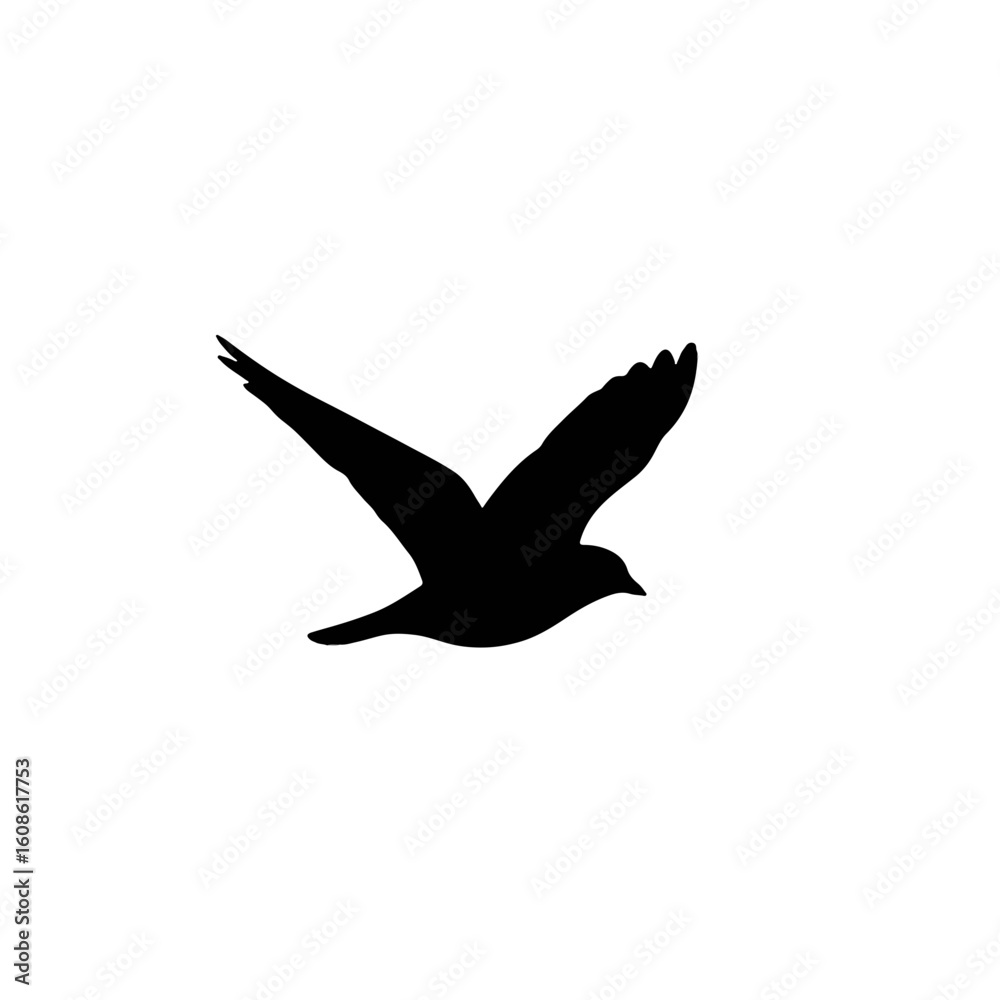 Obraz premium Abstract black bird silhouette in graceful flight, representing freedom, migration, and natural cycles for autumnal equinox designs.