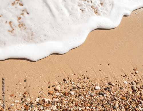 Ocean Wave Foam at Shoreline: White Sea Bubbles Gently Touching Sandy Beach with Natural Texture and Calm Atmosphere for Coastal Design, Relaxation Concept, and Summer Background