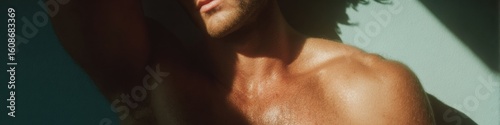 Professional sunburned young man inspecting UV damaged skin at home Authentic health concept for dermatology marketing and social media campaigns