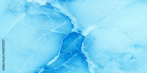Beautiful light blue and green marble texture It features an array of soft turquoise, White and slightly bluish green or beige veining runs organically across the surface using for wall decor.