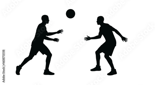 Two Basketball Players Passing a Ball in Silhouette Style silhouette