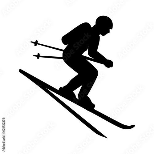 Silhouette of skier going downhill on snowy slope
