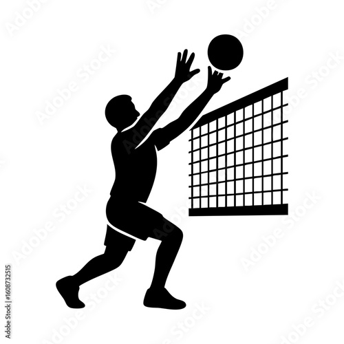 Silhouette of volleyball player blocking the ball