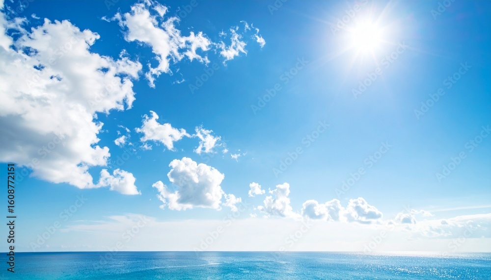 Obraz premium Bright blue sky with scattered white clouds of varying shapes and textures