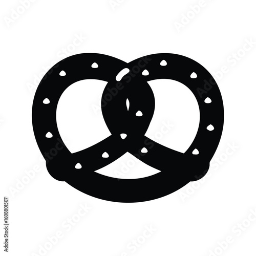 Silhouette of a traditional pretzel with visible salt granules on the surface