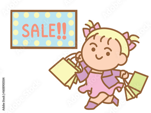 A young girl is holding shopping bags.