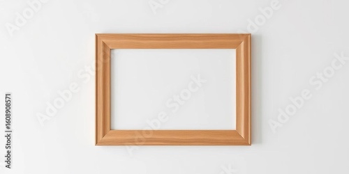 Simple, empty picture frame on a bright white wall, interior design, display