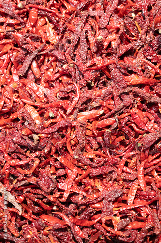Fototapeta Naklejka Na Ścianę i Meble -  Red chilli pepper spices for sale on a spice market in Mumbai, India, fresh ingredients for cooking indian food