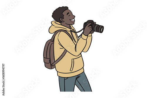 Joyful young black man with a backpack and camera captures a moment smiling as he looks up and takes a photograph