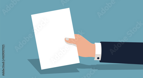 Hand Holding an Envelope Ready to Be Delivered