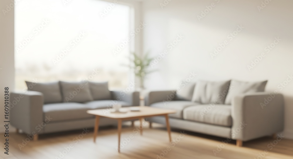 Fototapeta premium Design Details of Blurred interior of light living room with grey sofas