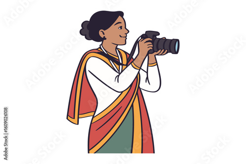 Indian woman in traditional attire captures a moment with her digital camera focused on photography