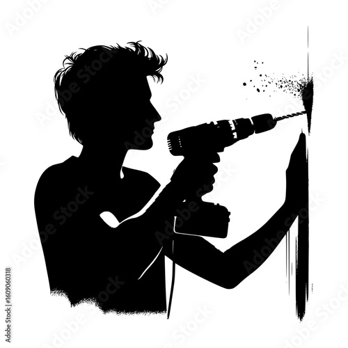 Silhouette of a person drilling a hole in a wall with a power drill