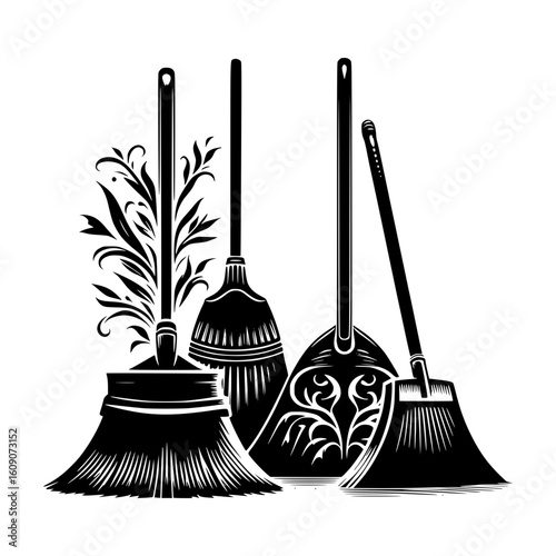 Collection of antique brooms and dustpan with decorative elements