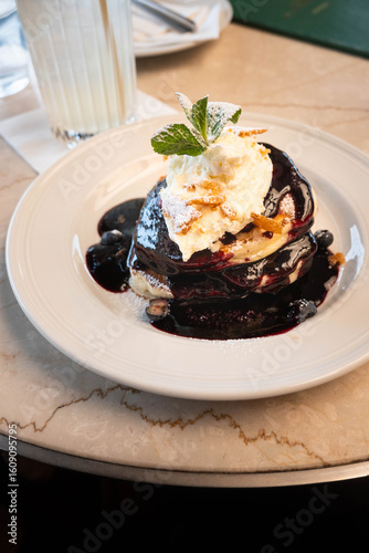 Homemade pancakes with blueberry sauce