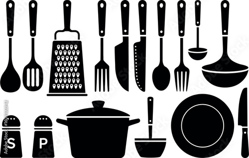 A collection of kitchen utensils including spoons, forks, knives, and other cooking equipment items