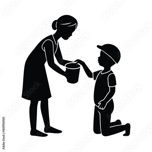 A woman giving food in a boy