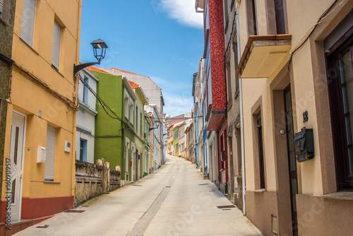 Fototapeta Naklejka Na Ścianę i Meble -  Colorful architecture in the main street of Cariño, a small town of Galicia, Spain.