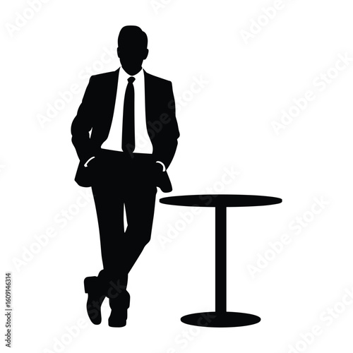 Silhouette of a businessman in a suit leaning against a table