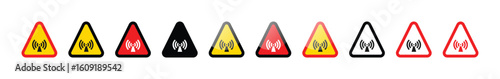 A row of triangular warning signs with antenna symbols in various colors